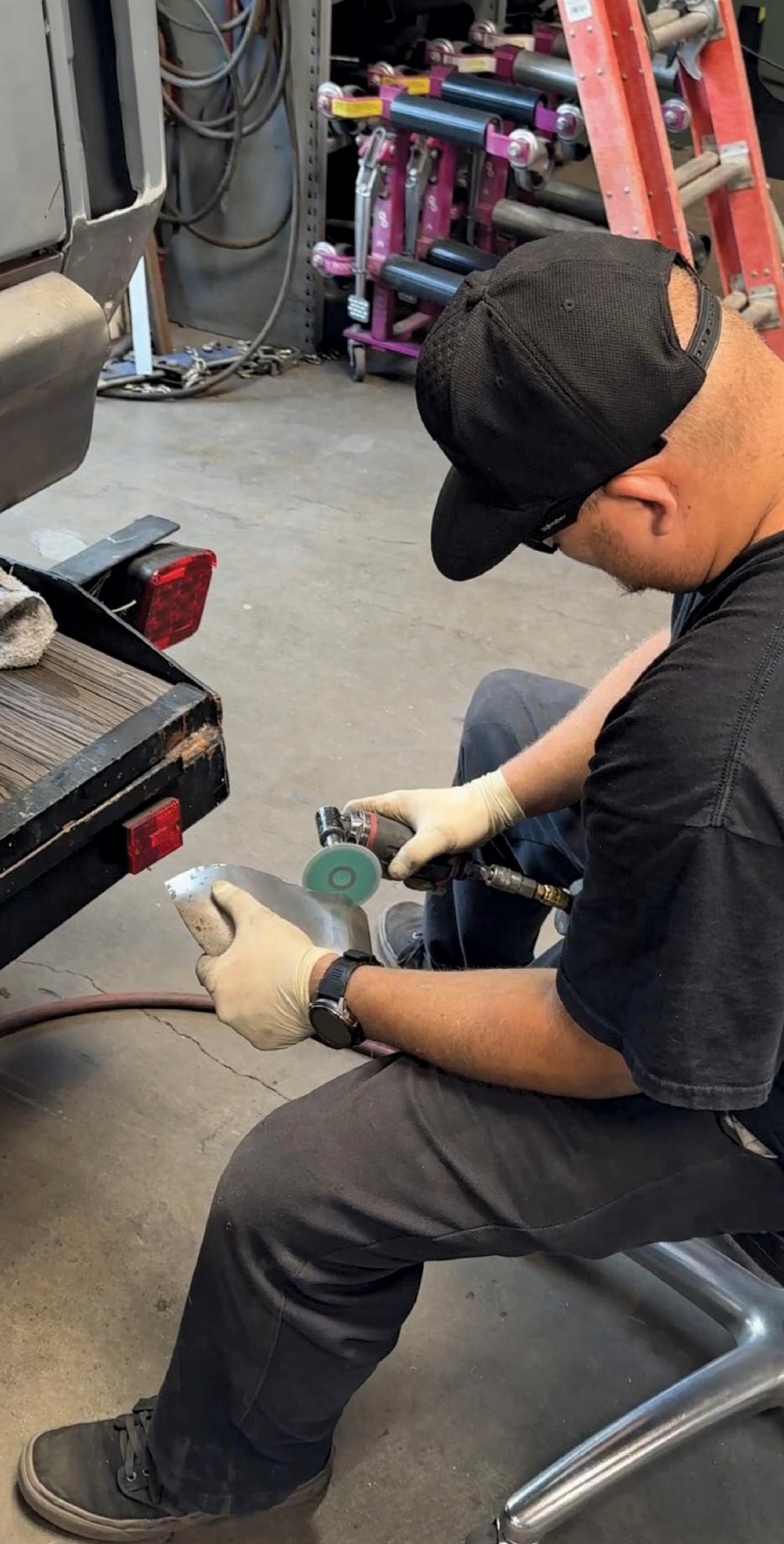 1967 c10 bumper piece prep grinding with roloc disc in fab shop