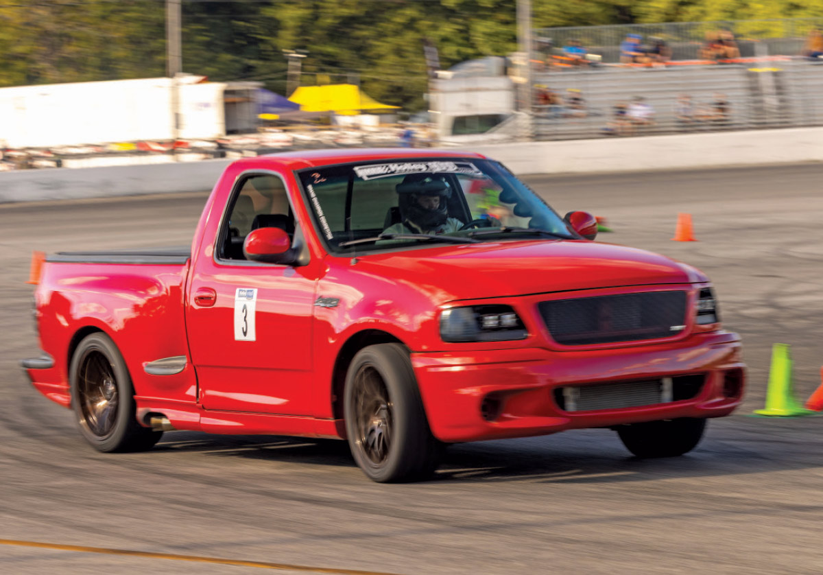 2003 Ford F-150 SVT Lightning red performance truck autocross