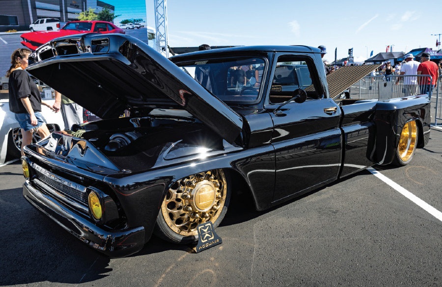 1966 c10 stepside black gold wheels accuair slammed engine bay open custom show truck