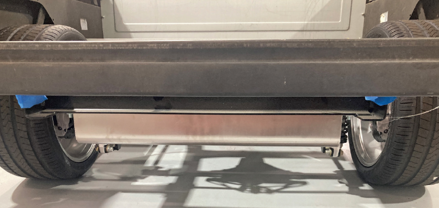 stainless fuel tank visible beneath rear frame after installation