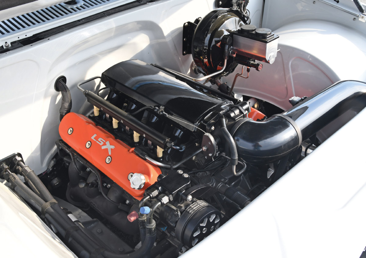 1986 Chevy C10 LSX engine bay gloss black intake custom plumbing white paint