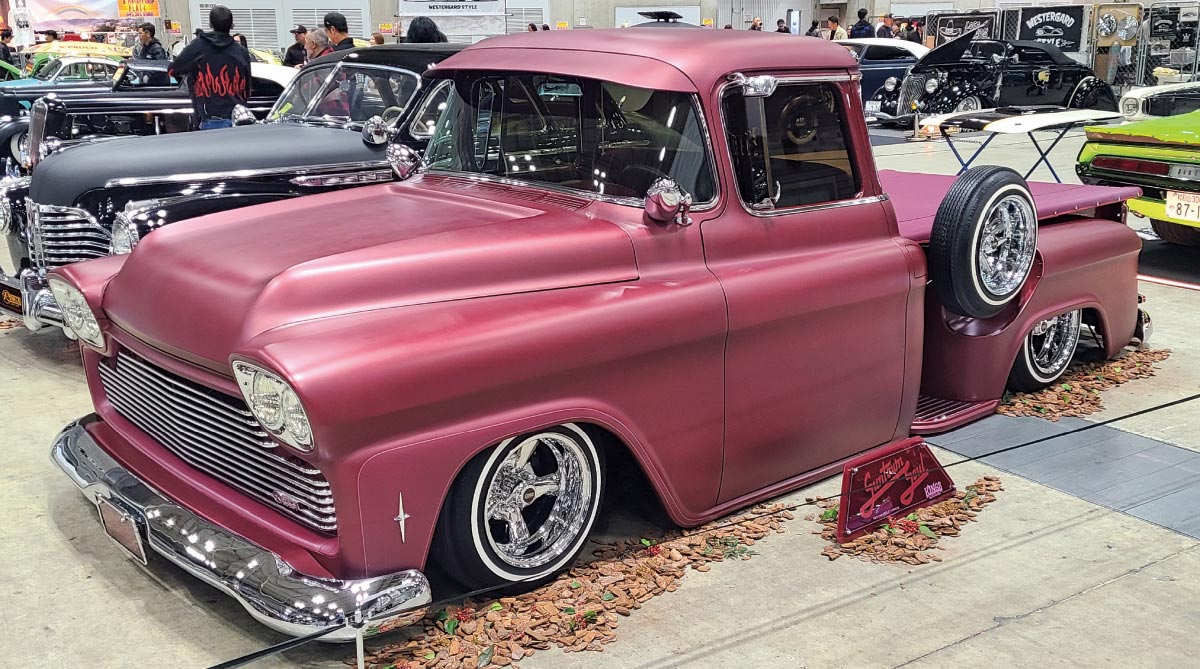 1958 Chevrolet Apache custom maroon satin slammed pickup chrome wheels indoor show
