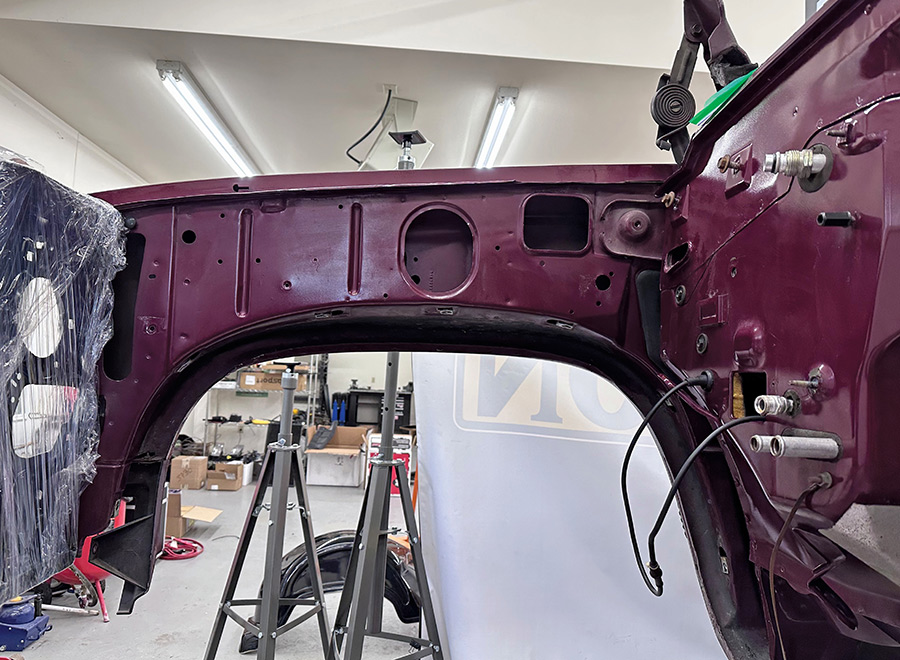 Original stock inner fender before cutting for clearance.