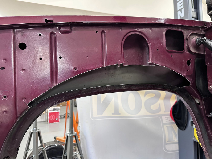 Vertical and horizontal cuts made to stock inner fenders.