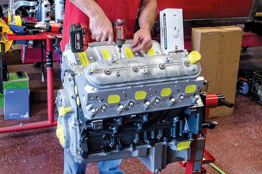 Removing the engine's valley cover with a tool