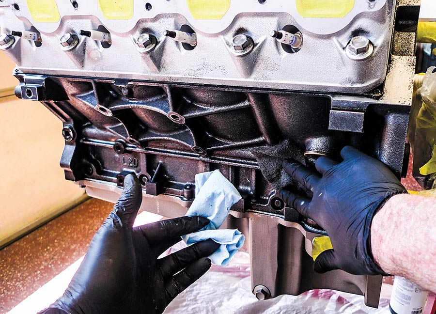 Using a scuff pad to prep engine surfaces
