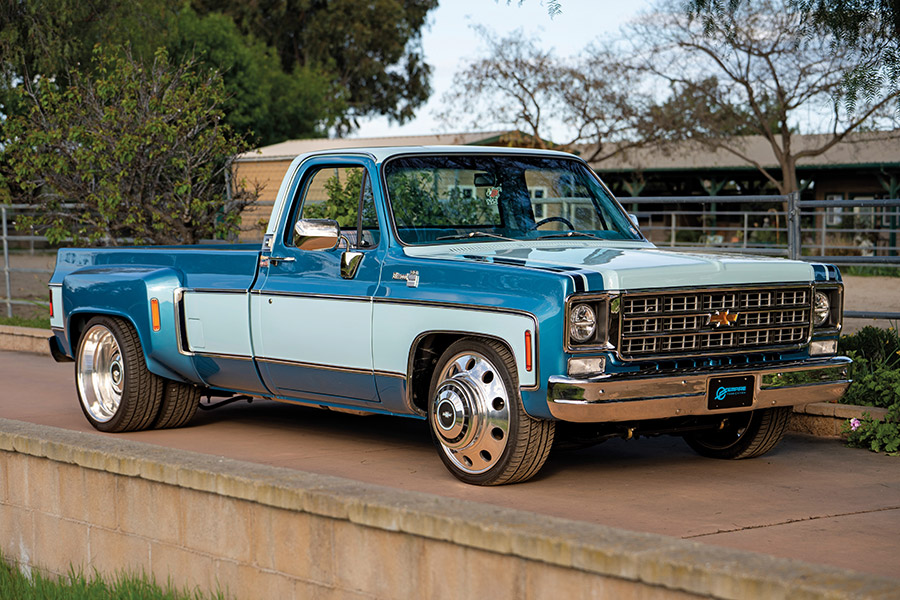 Front 3/4 view of the blue and white pickup.