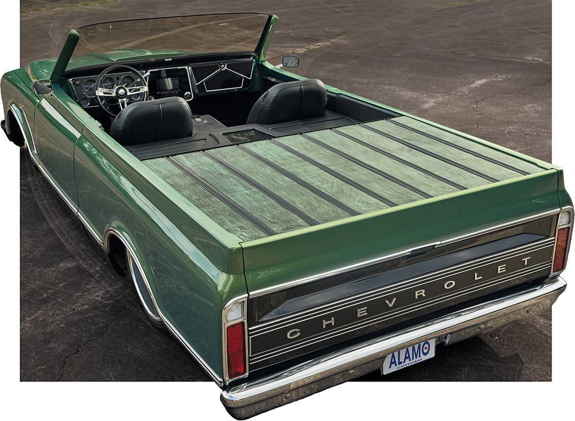 Detailed view of the custom-stained green wood bed tonneau cover
