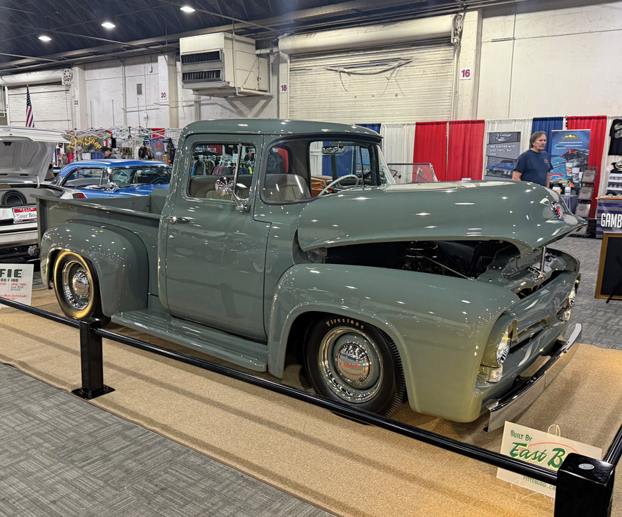 Grey 1956 Ford F100 on display.