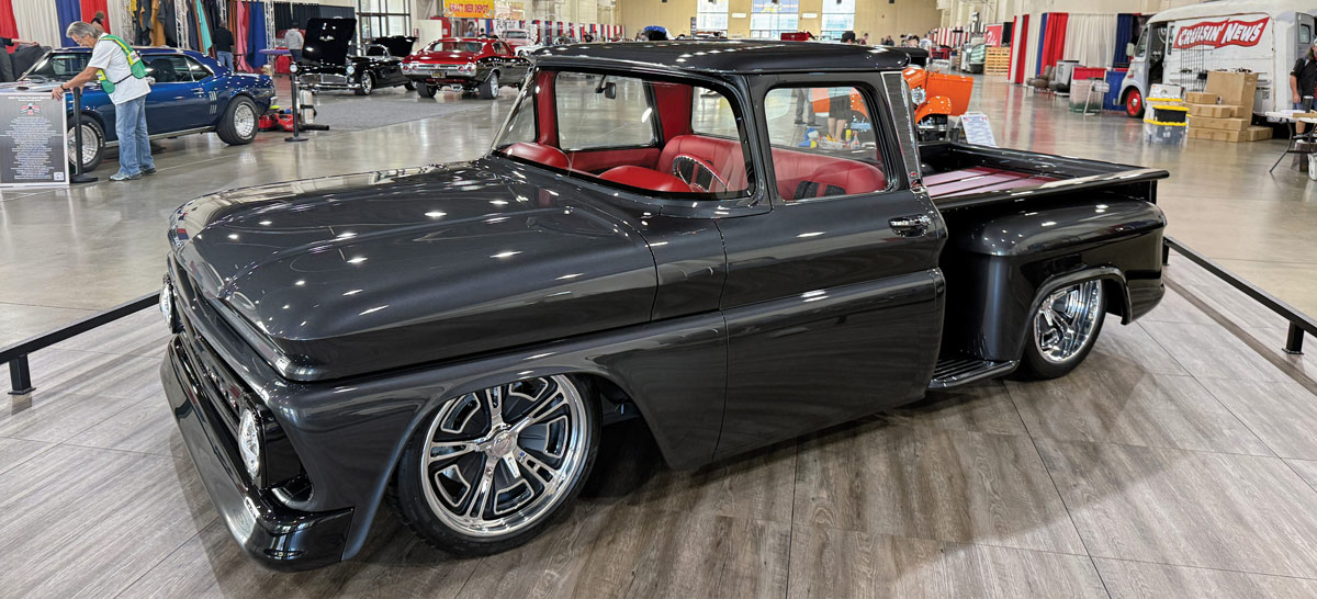 Dark grey Chevrolet C10 on indoor display.