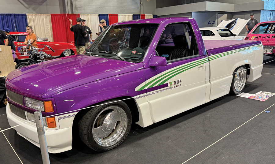 Purple and white Chevrolet OBS pickup.