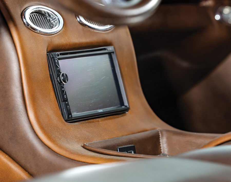 Custom center console with double-din touchscreen unit.