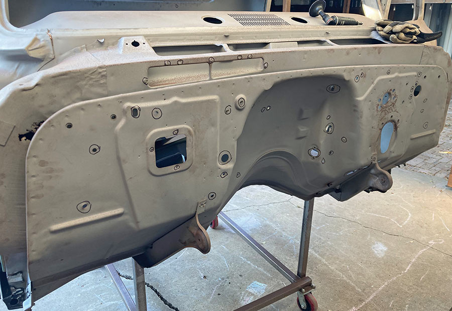 Full view of C10 cab firewall on a rolling stand