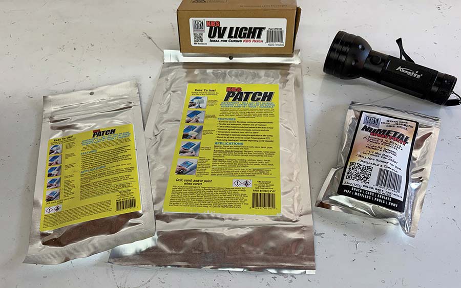 KBS Patch kit components including UV light and epoxy putty.