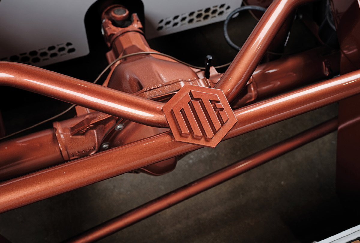 Copper-painted rear differential with custom MTI logo emblem.