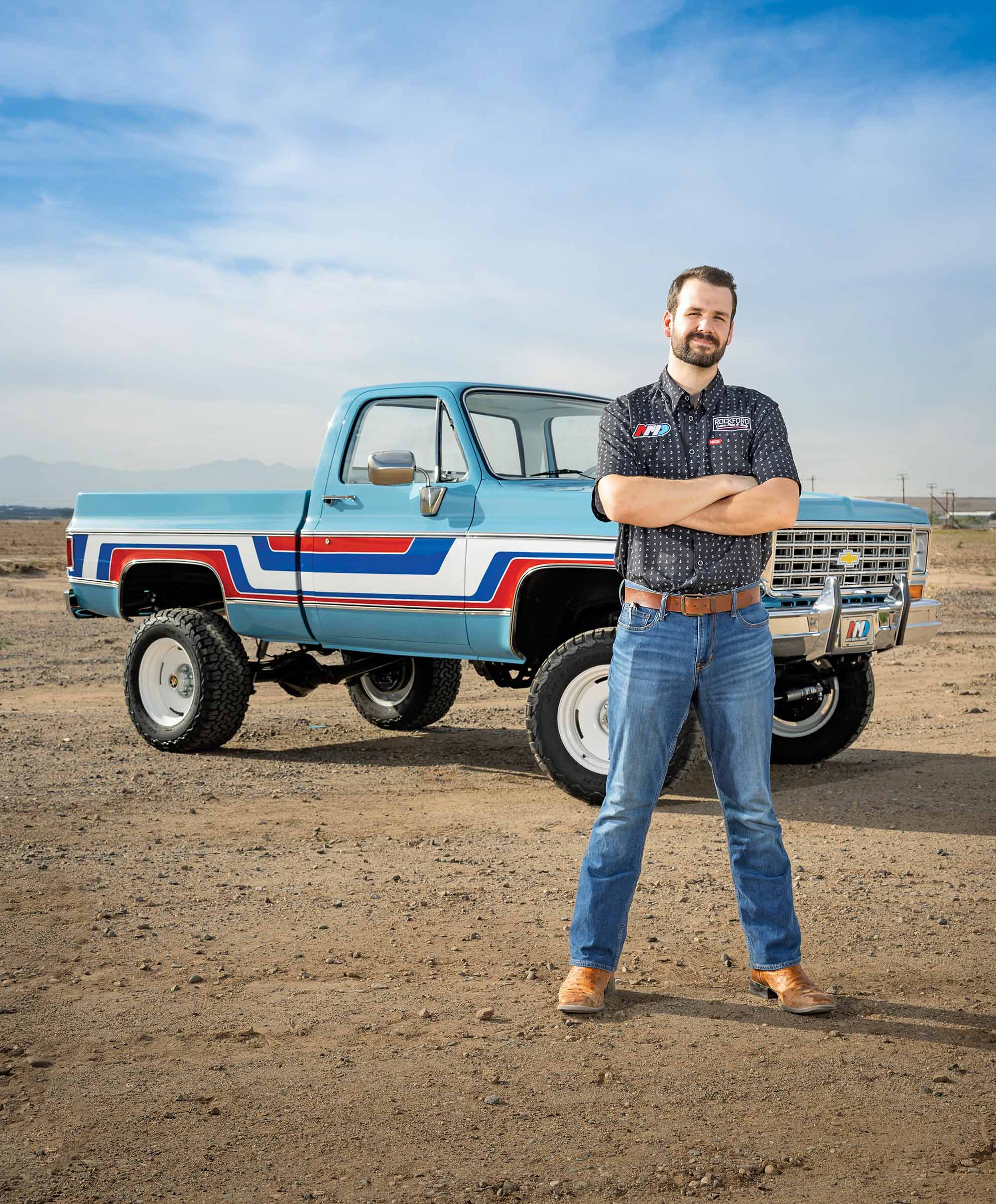 Rockford Smith standing in front of his 1976 Chevy K10.