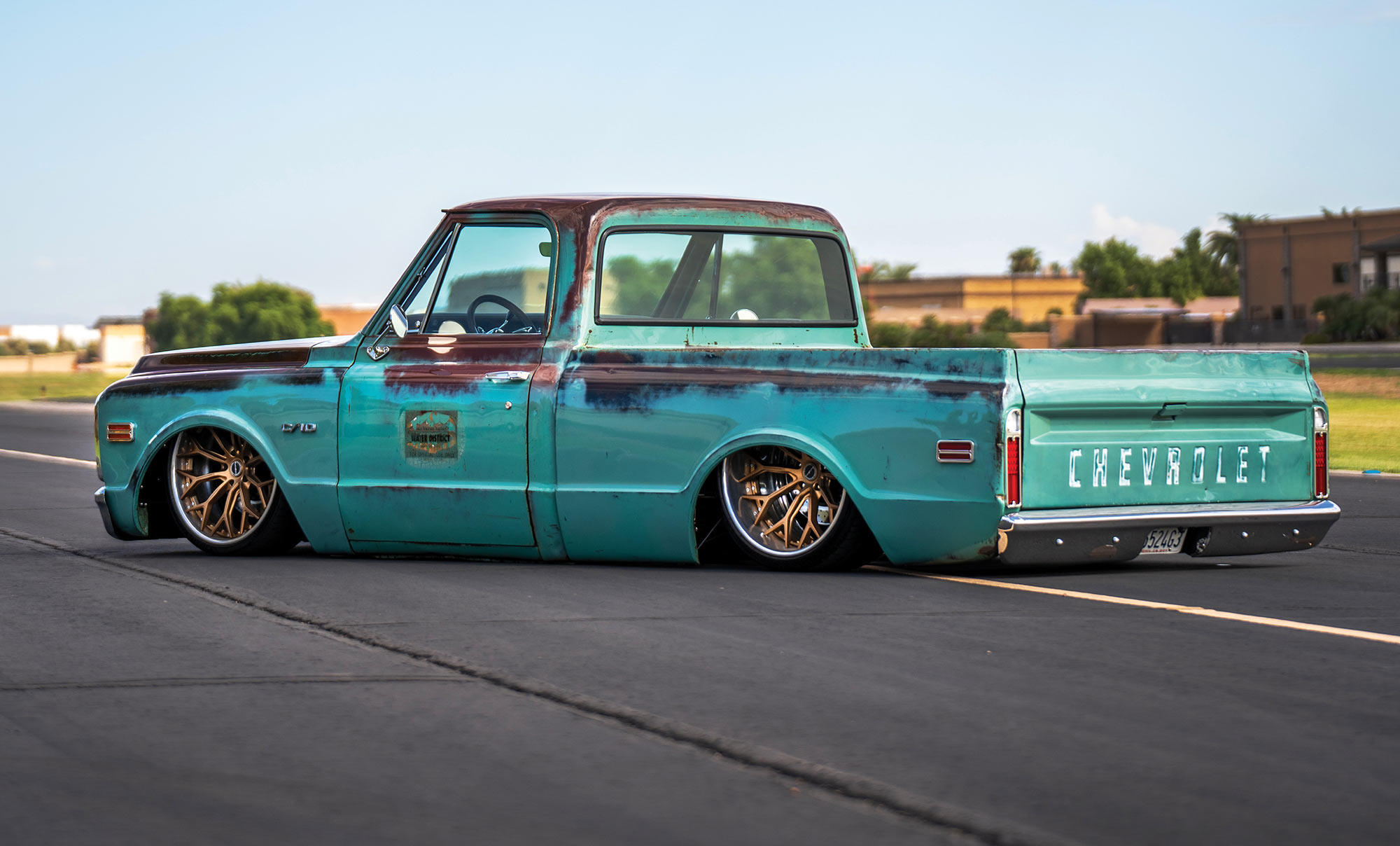 Patina 1969 Chevy C10 side profile showing low ride height.