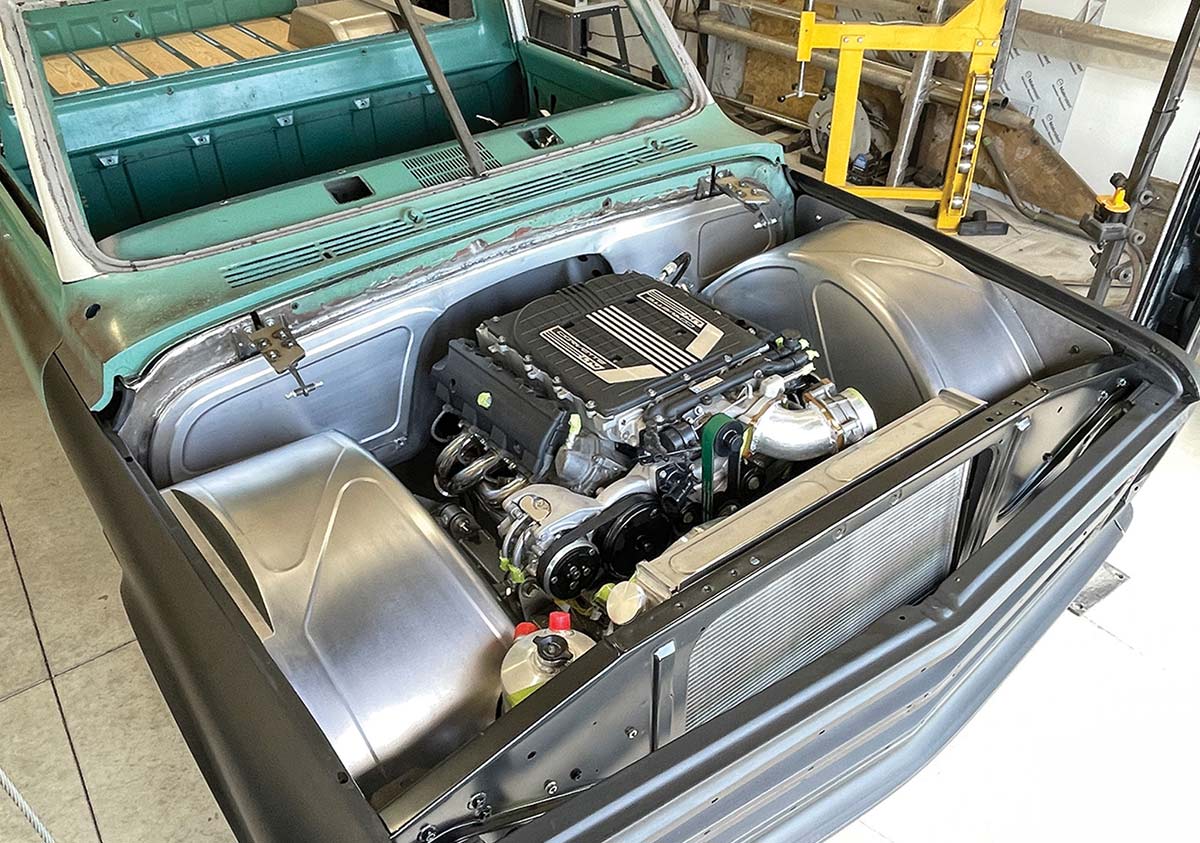 Supercharged engine seated in a custom engine bay