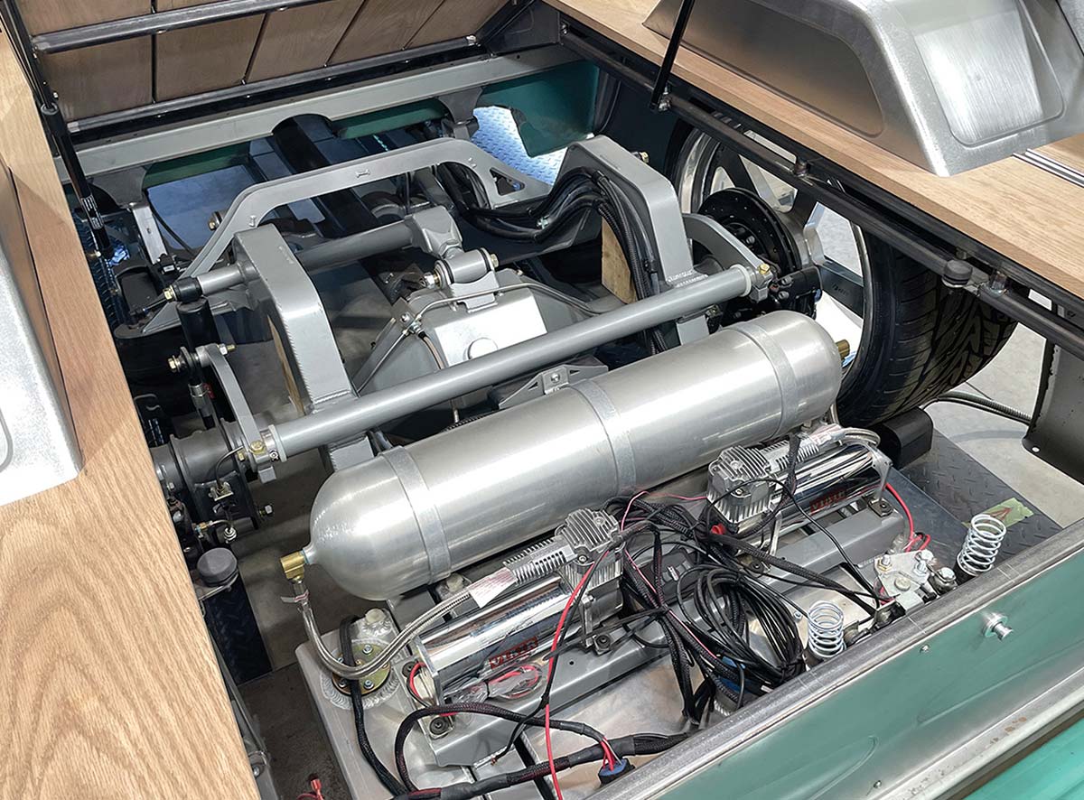 Air management system with tank and dual compressors