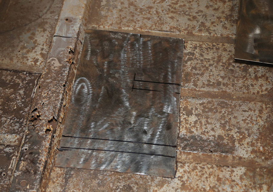 Scribed 18-gauge sheetmetal patch for floor repair.