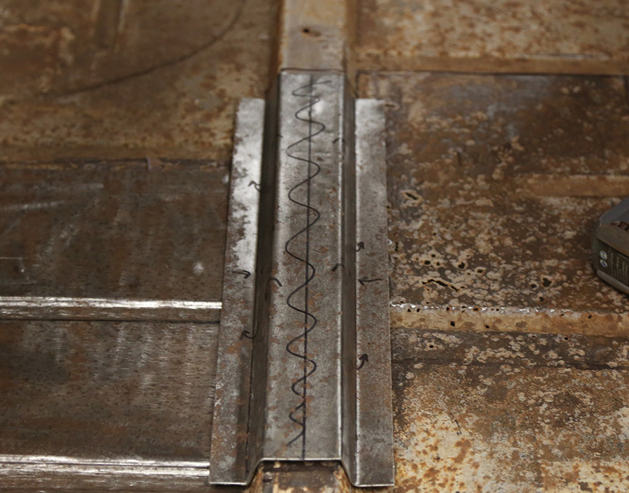 Positioned metal patches inside the truck cab floor.