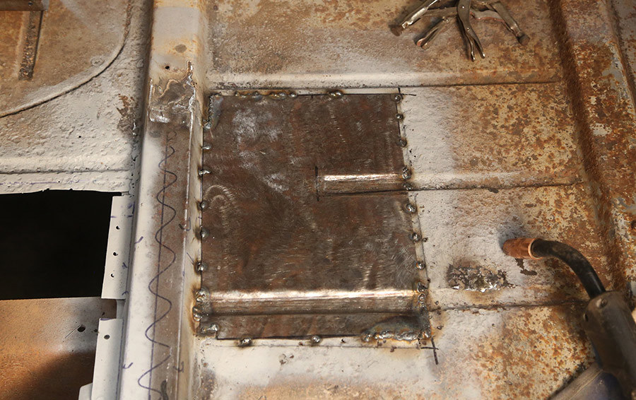 New floor patch tack welded into position.