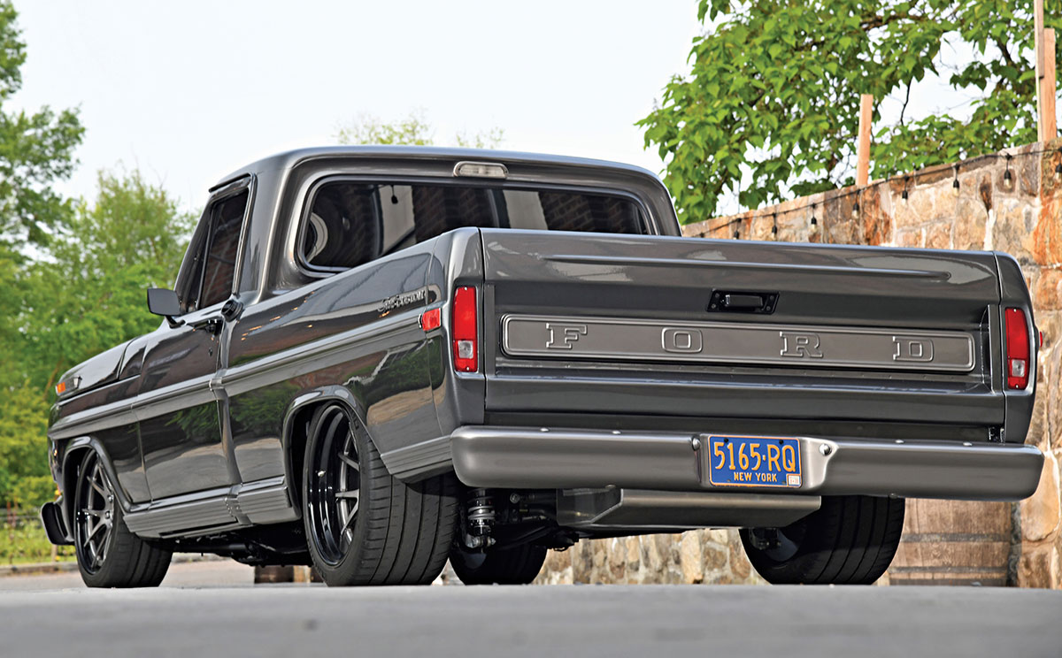 Rear view showing the tailgate and custom exhaust of an F-100.
