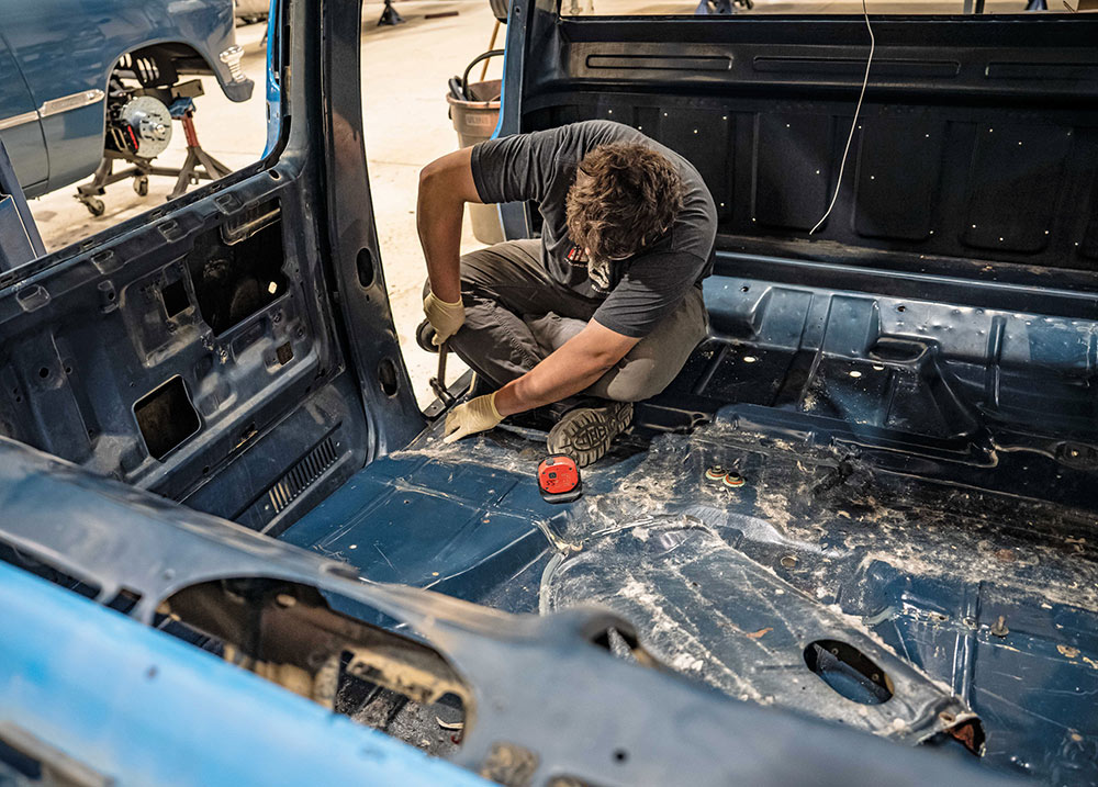 Inspecting and repairing sound cab floor panel.