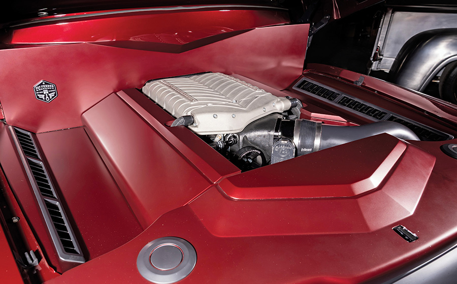 Top-down view of the supercharged Coyote engine in a clean engine bay.