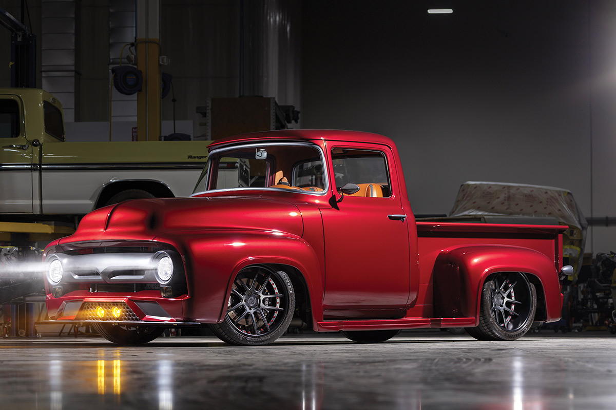 Front three-quarter view of the custom red 1956 Ford F-100.
