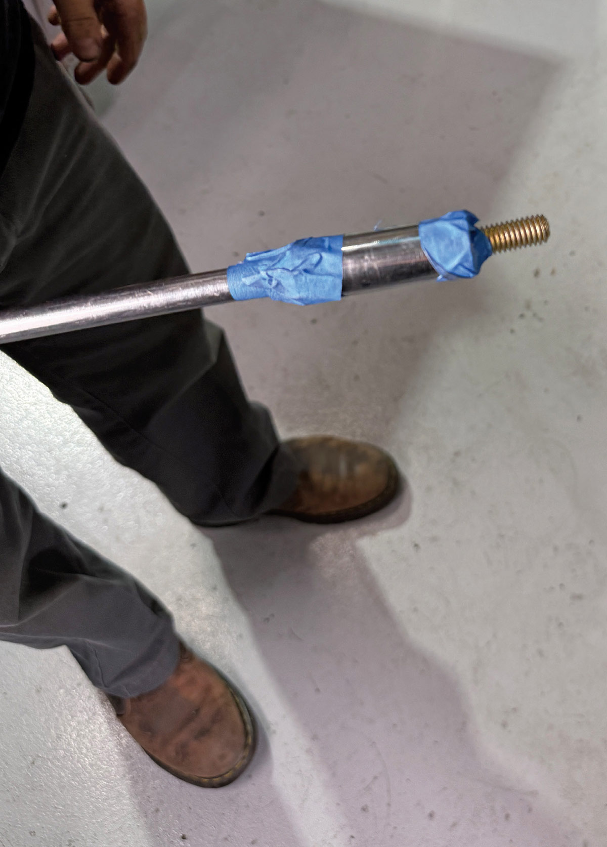 Mounting bolt taped to a socket.