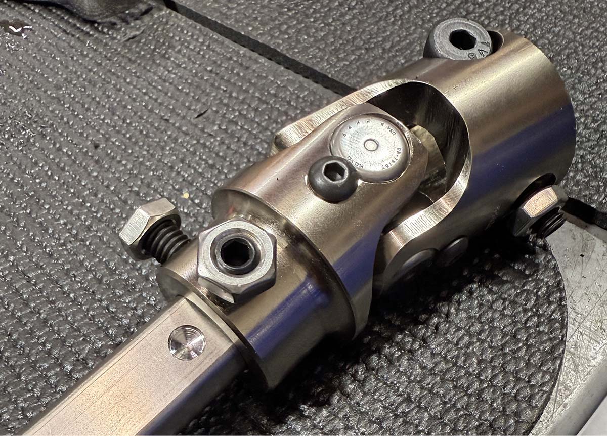 Dimpling the steering shaft for set screw placement.
